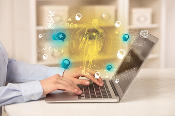 Doctor working on laptop with healthcare concept