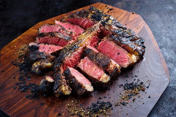 Modern style traditional barbecue dry aged wagyu porterhouse beef steak bistecca alla Fiorentina...