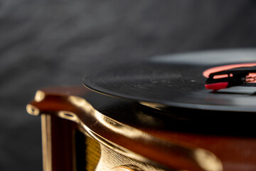 Vinyl record player. Old school  style cinemagraph loop vinyl record player. Close up view of vintage plate player. Old style sound technology to play music. Rotating vintage phonograph  - obrazy, fototapety, plakaty
