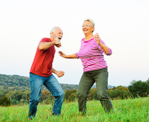 woman man outdoor senior couple happy elderly training active exercise stretching fitness  retirement together love dancing nature mature