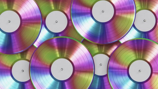 Realistic seamless looping 3D animation of the colorful spinning trippy colors iridescent vinyl records with blank white labels rendered in UHD as motion background
