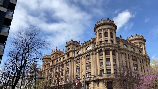 Classic bourgeoisie building on sunny day in Bilbao city. Wealthy neighborhood, real estate concepts