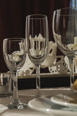 Three crystal glasses on the table in restaurant. Crystal glasses on the table