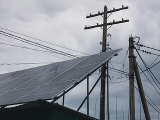 solar cells in power station with electric pillars