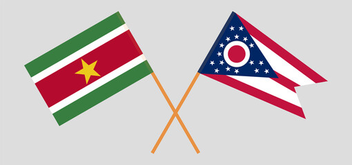 Crossed flags of Suriname and the State of Ohio. Official colors. Correct proportion