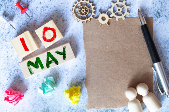 May 10th. Image of may 10 wooden color calendar on blue background. Spring day, empty space for text.