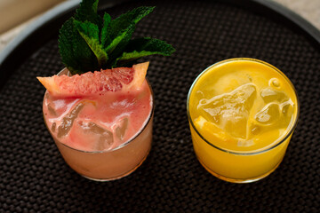 From the top two tropical drinks made with citrus fruits