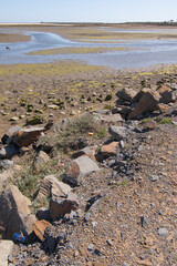 Isla Cristina, Huelva, Spain. Garbage, plastic on the beach breakwater.