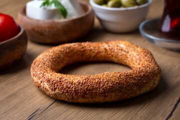 Turkish fast food bagel called Simit. Turkish bagel Simit with sesame. Bagel is traditional Turkish bakery food. Turkish name; simit - gevrek