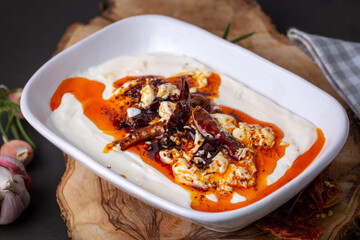 Traditional Turkish and Greek Meze with chili peppers. Turkish Appetizer Atom with yogurt. Turkish atom meze