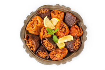 Dried eggplant stuffed and dried pepper stuffed with rice, tomato and olive oil known as dolma. (Turkish name; kuru biber dolmasi, kuru patlican dolmasi)