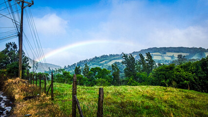 rainbow over the fence