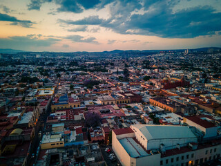 hermosa vista aerea de dron de el centro de queretaro mexico, drone clouds, city, colonial city, green grass, football filed