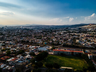 hermosa vista aerea de dron de el centro de queretaro mexico, drone clouds, city, colonial city, green grass, football filed