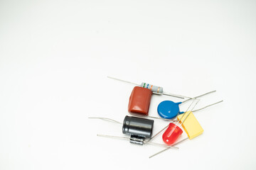 Group of various electronic components: diode, capacitors, resistors, LEDs. isolated on white...