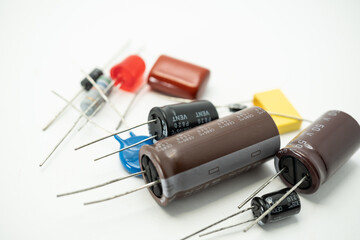 Group of various electronic components: diode, capacitors, resistors, LEDs. isolated on white...