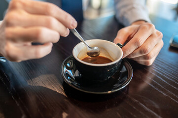 Businessman having morning coffee in a cafe