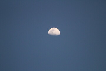 Half Moon With Clear Blue Sky 