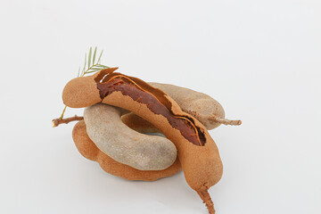 Sweet tamarind ripe is fruit in tropical  on white background.