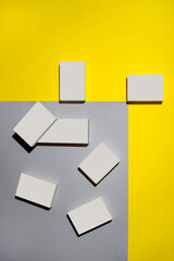 Abstract still life with white shapes on a colored background