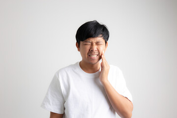 Man with toothache on a white background