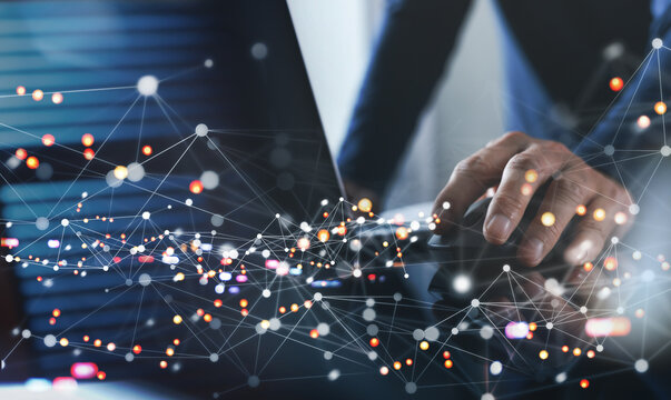 Internet network connection, digital technology background, IoT Internet of Things concept. Man using computer laptop with line and dot connection