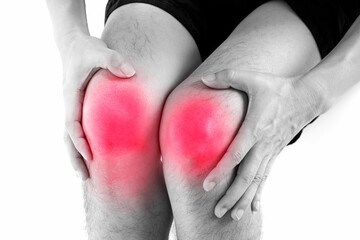 Knee pain .man standing caught his knee.  health concepts