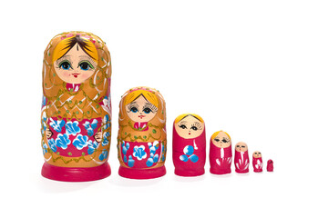 Red colored nesting dolls on a white background. Russian national souvenir