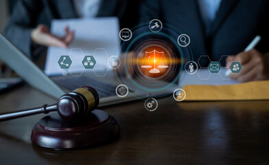 Concepts of Law and Legal services. Lawyer working with law interface icons. Blurred background.	