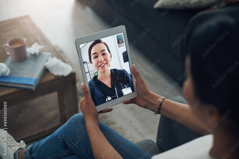 Poster im happy to see you again. shot of an unrecognizable person on a videocall with a doctor.