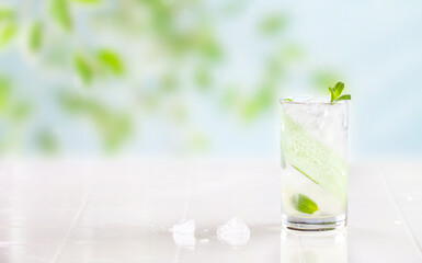 Summer background with cucumber drink