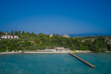 Panoramic aerial view of Lido delle Bionde beach, Sirmione, Lake Garda, Italy