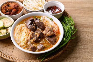 Northern Thai food, Spicy rice noodles soup with pork eating with fresh vegetables, Local Thai food