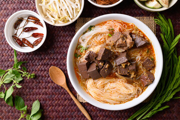 Northern Thai food, Spicy rice noodles soup with pork eating with fresh vegetables, Local Thai food