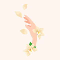 A woman's hand with flowers and orchid petals.