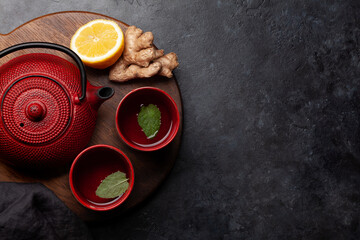 Tea with lemon and mint and teapot