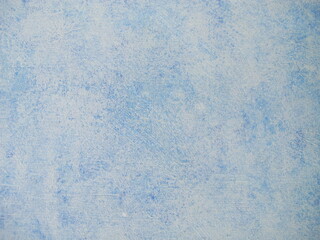 Wood painted with blue chalk paint and paint roller in vintage style