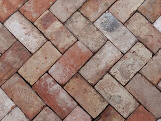 Reclaimed house bricks in a herringbone pattern