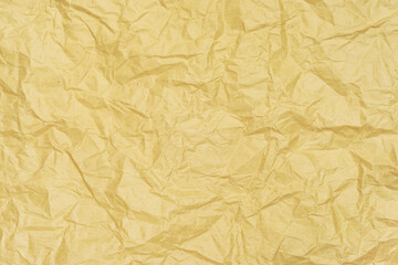 texture background of crumpled golden craft paper