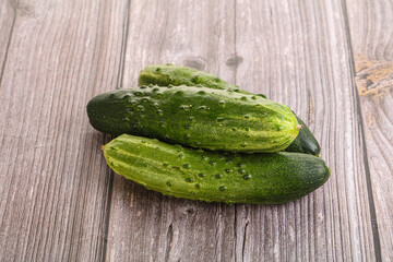 Fersh juicy green cucumbers heap