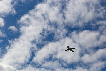 Plane ready to taking to land. Blue sky on a background.