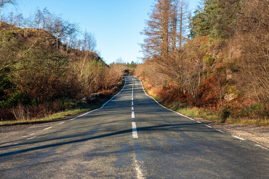 UK, Wales, Empty Highway In Snowdonia National Park During Autumn