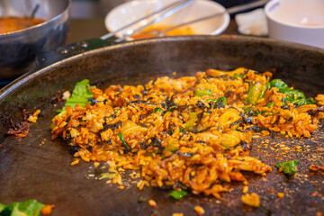 Korean style stir-fried rice in a iron plate