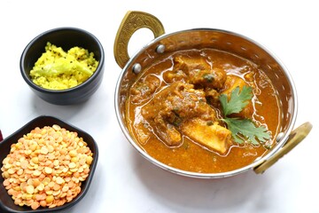 Dal Gosht or Daal Gosht is one of the very popular Mutton Recipes in India. Mutton cooked with spices and mixed lentils. Mutton dalcha with Tur dal and masoor dal. Copy space. Mutton curry in Kadai.