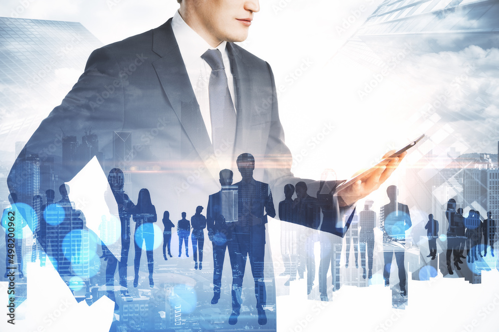 Poster businessman using smartphone with abstract crowd of businesspeople standing on abstract bright city 