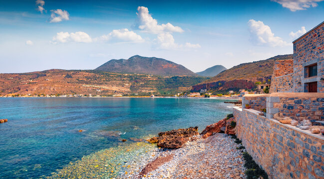 Adorable summer cityscape of Neo Itilo village. Marvelous seascape of Ionian sea. Sunny morning scene of Peloponnese peninsula, Greece, Europe. Traveling concept background.