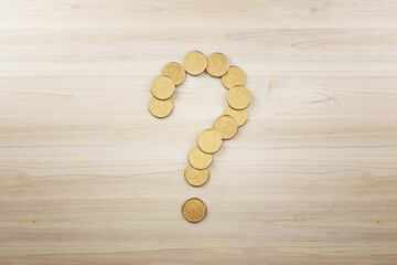 Abstract creative golden coin question mark on wooden surface background with mock up place. Money, uncertainty and crisis concept. 3D Rendering.
