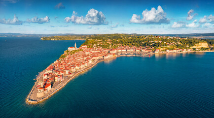 Sunny summer cityscape of Piran town. Picturesque outdoor scene of Slovenia’s Adriatic coast with...