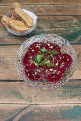 Cooked beetroot topped with seeds 