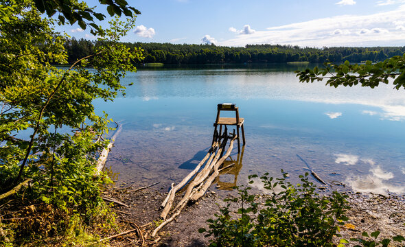 Wooded shore of Jezioro Gwiazdy lake in Bukowo Borowy Mlyn Village near Bytow of Pomerania in Kashubian region of northern Poland